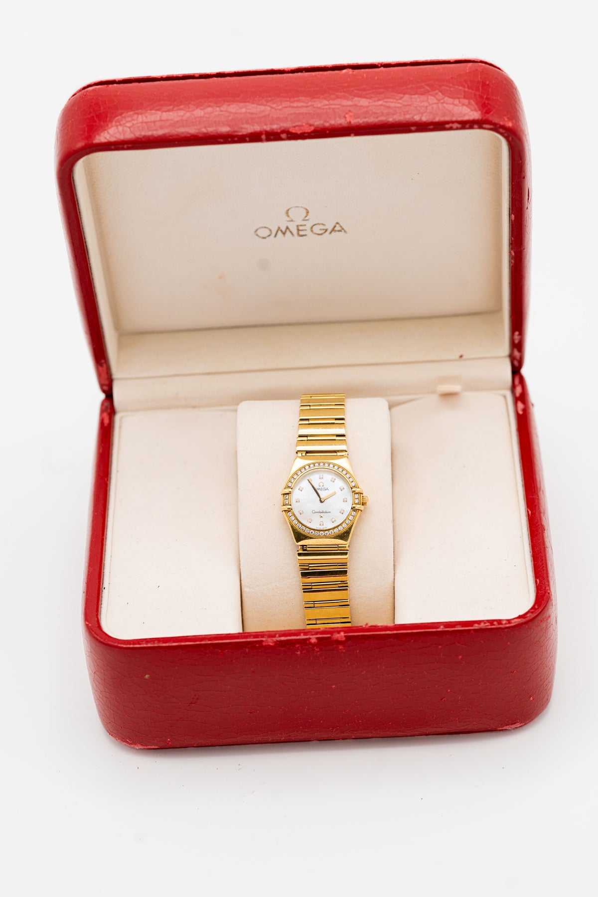 Omega Constellation d’occasion – Tons dorés, cadran clair et détails sertis
