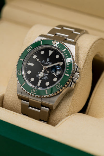 Rolex Submariner Date d’occasion – Lunette verte et cadran noir